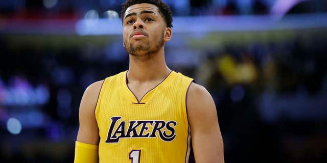 FILE - In this March 4, 2016, file photo, Los Angeles Lakers' D'Angelo Russell makes his way down the court during the first half of an NBA basketball game against the Atlanta Hawks, in Los Angeles.