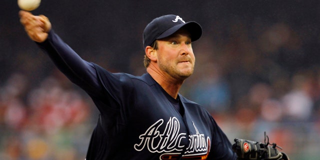 March 31: Atlanta Braves pitcher Derek Lowe throws the ball in the second inning of their opening day baseball game with the Washington Nationals in Washington.