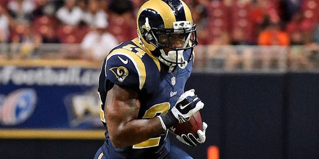 Sep 3, 2015; St. Louis, MO, USA; St. Louis Rams running back Isaiah Pead (24) runs the ball against the Kansas City Chiefs during the first half at the Edward Jones Dome. Mandatory Credit: Jasen Vinlove-USA TODAY Sports