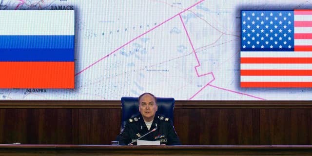 FILE - In this file photo dated Friday, Oct. 7, 2016, Russian Deputy Defense Minister Anatoly Antonov speaks during a media briefing in the Defense Ministry in Moscow. While Western media are filled with grim images of life in areas of Aleppo under siege by Russian-backed Syrian government forces, Russian news reports tell a very different story. (AP Photo/Ivan Sekretarev, File)