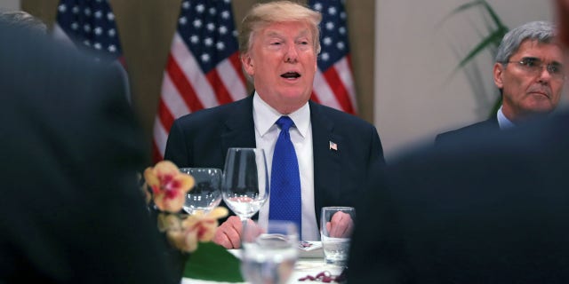 President Trump attends a dinner with business leaders and heads of state during the World Economic Forum in Davos, Switzerland.