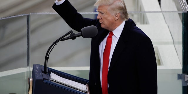 President Donald Trump pumps his fist after delivering his inaugural address after being sworn in as the 45th president of the United States during the 58th Presidential Inauguration at the U.S. Capitol in Washington, Friday, Jan. 20, 2017. (AP Photo/Matt Rourke)