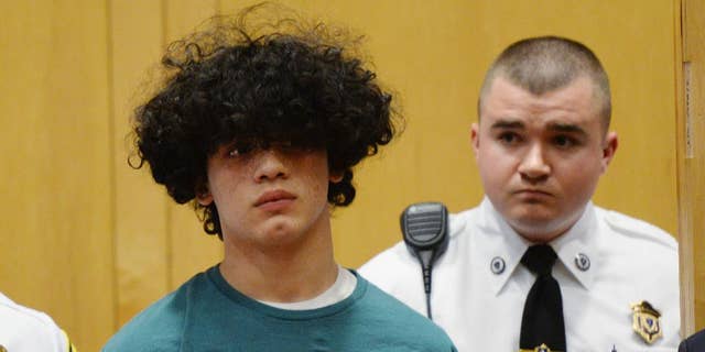 Mathew Borges, 15, attends his appearance at the Lawrence District Court in Lawrence, Mass, in December 2016.