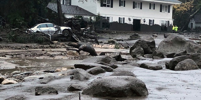 In this photo provided by Santa Barbara County Fire Department, mud and debris flow due to heavy rain in Montecito. Calif., Tuesday, Jan. 9, 2018.