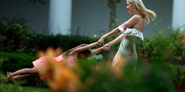 Ivanka Trump, the daughter and assistant to President Donald Trump, swings her daughter Arabella Kushner in the Rose Garden at the Congressional Picnic on the South Lawn of the White House, Thursday, June 22, 2017, in Washington. (AP Photo/Alex Brandon)