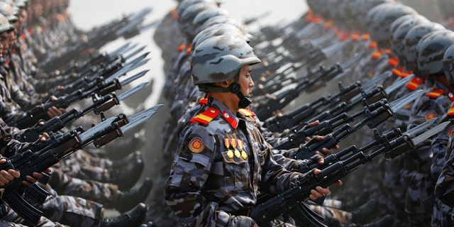 North Korean soldiers march during a military parade marking the 105th birth anniversary of country's founding father, Kim Il Sung in Pyongyang, North Korea April 15, 2017.