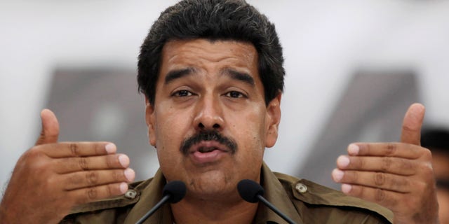 Venezuela's acting President Nicolas Maduro speaks during an event at the Casa Nacional de las Letras Andres Bello, where independence hero Simon Bolivar started his studies, in Caracas, Venezuela, Monday, April 1, 2013. Both Nicolas Maduro, Chavez's chosen successor, and opposition Gov. Henrique Capriles face the challenge of spelling out a vision for a future without Chavez, who dominated this 28 million-person country like few other leaders have during his 14 years in power. Venezuela will hold a presidential election on April 14. (AP Photo/Ariana Cubillos)