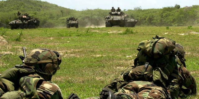 Us Marines Practice Assaulting An Enemy Position August 6, 2001 On The Puerto Rican Island Of Vieques. The Us Marine Corps Are Conducting A Training Exercise On The Island, Which Is Also The Site Of A Controversial Us Navy Bombing Range.