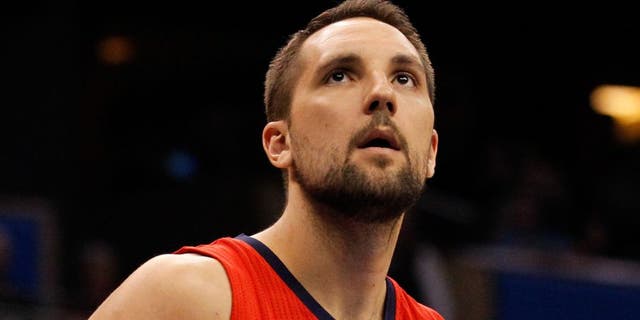 Feb 20, 2015; Orlando, FL, USA; New Orleans Pelicans forward Ryan Anderson (33) against the Orlando Magic during the second half at Amway Center. Orlando Magic defeated the New Orleans Pelicans 95-84. Mandatory Credit: Kim Klement-USA TODAY Sports