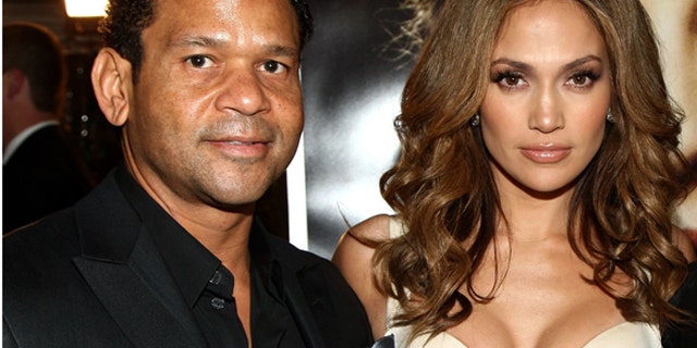 WESTWOOD, CA - DECEMBER 08: Celebrity agent Benny Medina, actress/singer Jennifer Lopez and CEO of Paramount Pictures Brad Grey arrive at the premiere of Paramount's "The Curious Case Of Benjamin Button" held at Mann's Village Theatre on Decemeber 8, 2008 in Westwood, California. (Photo by Alberto E. Rodriguez/Getty Images)