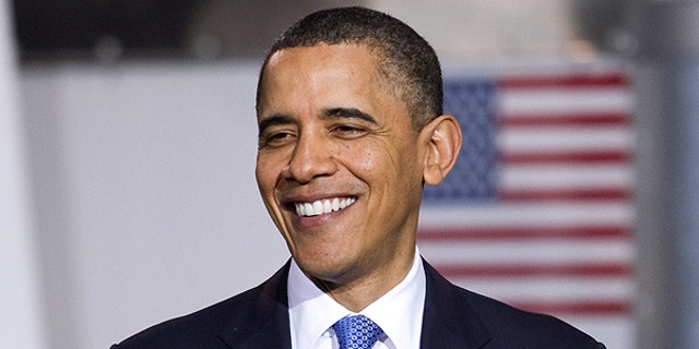 April 1: Obama smiles during an event to promote clean energy vehicles at a UPS facility in Landover, Md.