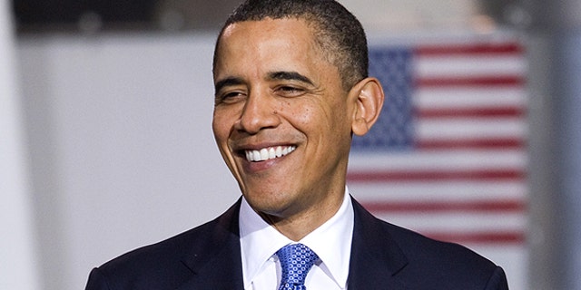 April 1: Obama smiles during an event to promote clean energy vehicles at a UPS facility in Landover, Md.