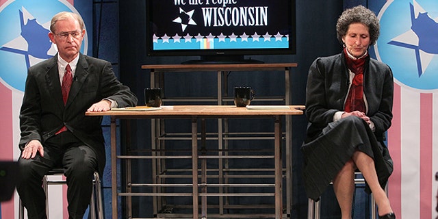 FILE: This March 25, 2011, photo shows Justice David Prosser, left, and Asst. Attorney General JoAnne Kloppenburg, before a debate at Wisconsin Public Television studio in Madison, Wis.