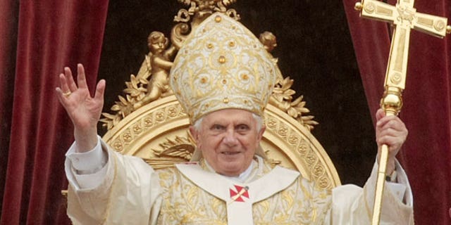 April 4: Pope Benedict XVI waves to faithful at the end of the Easter Mass in St. Peter's square at the Vatican.
