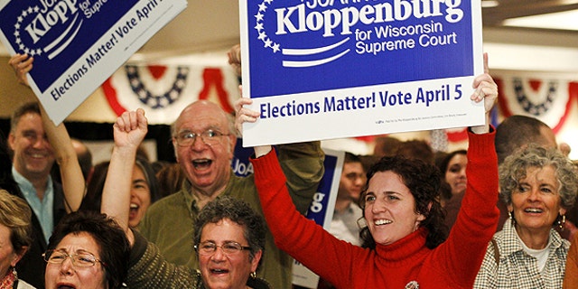 FILE: This April 2011 photo shows supporters for Wisconsin Supreme Court candidate JoAnne Kloppenburg in Madison, Wis. On May 31 Kloppenburg conceded to incumbent Justice David Prosser.