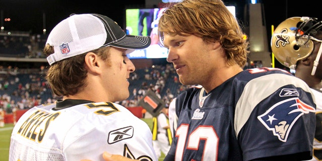 Aug. 12, 2010: New Orleans Saints quarterback Drew Brees, left, talks with New England Patriots quarterback Tom Brady after New England's 27-24 win in an NFL preseason football game in Foxborough, Mass.