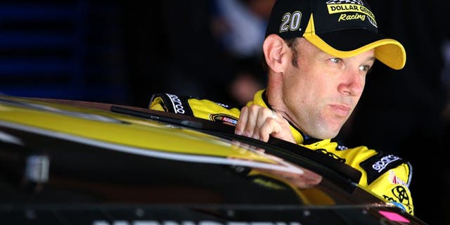 MARTINSVILLE, VA - APRIL 02: Matt Kenseth, driver of the #20 Dollar General Toyota, climbs into his car during practice for the NASCAR Sprint Cup Series STP 500 at Martinsville Speedway on April 2, 2016 in Martinsville, Virginia. (Photo by Sean Gardner/NASCAR via Getty Images)
