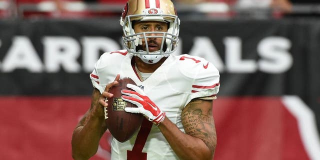 against the San Francisco 49ers at University of Phoenix Stadium on September 27, 2015 in Glendale, Arizona.,GLENDALE, AZ - SEPTEMBER 27: Colin Kaepernick #7 of the San Francisco 49ers prepares for a game against the Arizona Cardinals at University of Phoenix Stadium on September 27, 2015 in Glendale, Arizona. (Photo by Norm Hall/Getty Images)