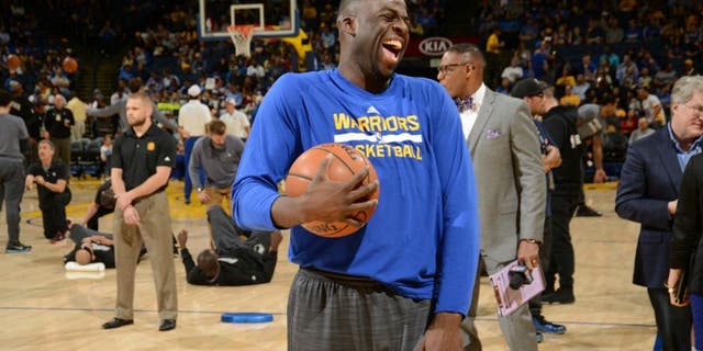 OAKLAND, CA - APRIL 5: Draymond Green #23 of the Golden State Warriors laughs facing the Minnesota Timberwolves on April 5, 2016 at Oracle Arena in Oakland, California. NOTE TO USER: User expressly acknowledges and agrees that, by downloading and or using this photograph, user is consenting to the terms and conditions of Getty Images License Agreement. Mandatory Copyright Notice: Copyright 2016 NBAE (Photo by Noah Graham/NBAE via Getty Images)