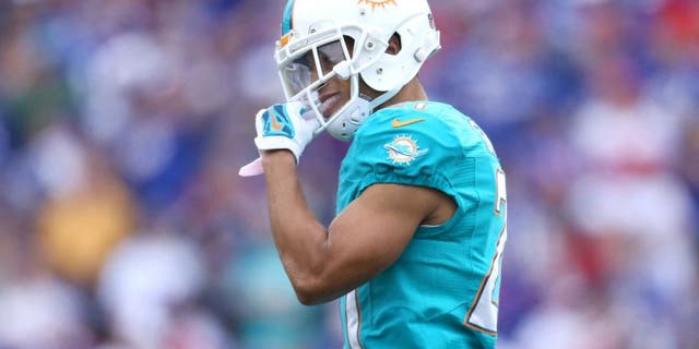 ORCHARD PARK, NY - SEPTEMBER 14: Brent Grimes #21 of the Miami Dolphins during NFL game action against the Buffalo Bills at Ralph Wilson Stadium on September 14, 2014 in Orchard Park, New York. (Photo by Tom Szczerbowski/Getty Images)