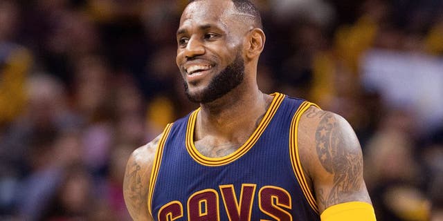 CLEVELAND, OH - APRIL 5: LeBron James #23 of the Cleveland Cavaliers smiles to the fans during the second half against the Chicago Bulls at Quicken Loans Arena on April 5, 2015 in Cleveland, Ohio. The Cavaliers defeated the Bulls 99-94. NOTE TO USER: User expressly acknowledges and agrees that, by downloading and or using this photograph, User is consenting to the terms and conditions of the Getty Images License Agreement. (Photo by Jason Miller/Getty Images)