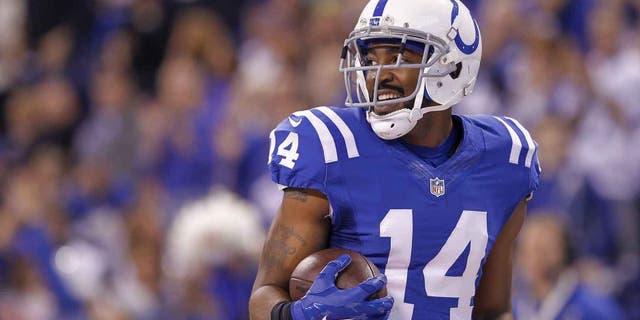 INDIANAPOLIS, IN - DECEMBER 14: Hakeem Nicks #14 of the Indianapolis Colts runs the ball against the Houston Texans at Lucas Oil Stadium on December 14, 2014 in Indianapolis, Indiana. (Photo by Michael Hickey/Getty Images)