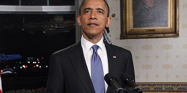 April 8: President Obama poses for photographers in the Blue Room at the White House in Washington after he spoke regarding the budget and averted government shutdown after a deal was made between Republican and Democrat lawmakers.