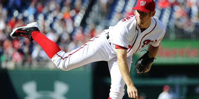 Apr 10, 2014; Washington, DC, USA; Washington Nationals pitcher Stephen Strasburg (37) throws during the second inning against the Miami Marlins at Nationals Park. Mandatory Credit: Brad Mills-USA TODAY Sports