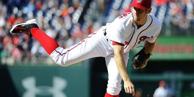 Apr 10, 2014; Washington, DC, USA; Washington Nationals pitcher Stephen Strasburg (37) throws during the second inning against the Miami Marlins at Nationals Park. Mandatory Credit: Brad Mills-USA TODAY Sports
