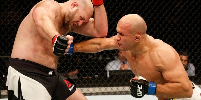 ZAGREB, CROATIA - APRIL 10: (R-L) Junior Dos Santos punches Ben Rothwell in their heavyweight bout during the UFC Fight Night event at the Arena Zagreb on April 10, 2016 in Zagreb, Croatia. (Photo by Srdjan Stevanovic/Zuffa LLC/Zuffa LLC via Getty Images)