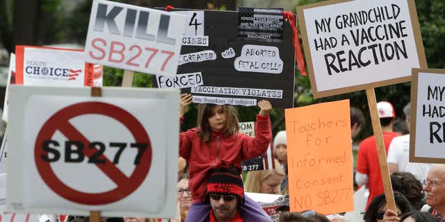 April 8, 2015: Protesters rally against a measure requiring California schoolchildren to get vaccinated at the Capitol in Sacramento, Calif.