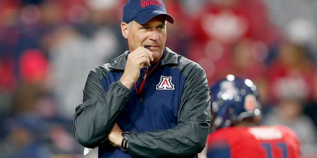 GLENDALE, AZ - DECEMBER 31: Head coach Rich Rodriguez of the Arizona Wildcats watches warm ups before the Vizio Fiesta Bowl against the Boise State Broncos at University of Phoenix Stadium on December 31, 2014 in Glendale, Arizona. (Photo by Christian Petersen/Getty Images)