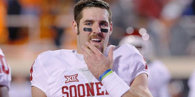 Nov 28, 2015; Stillwater, OK, USA; Oklahoma Sooners quarterback Trevor Knight (9) before the start of a college football game against the Oklahoma State Cowboys at Boone Pickens Stadium. Mandatory Credit: Alonzo Adams-USA TODAY Sports
