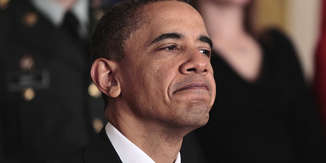 April 12: President Obama listens in the East Room of the White House during an event to launch Joining Forces, the national initiative to support and honor America's service members and their families.