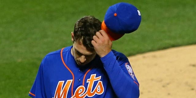 NEW YORK, NEW YORK - APRIL 11: Steven Matz #32 of the New York Mets walks off the mound after giving up 7-runs in the second inning against the Miami Marlins at Citi Field on April 11, 2016 in the Flushing neighborhood of the Queens borough of New York City.