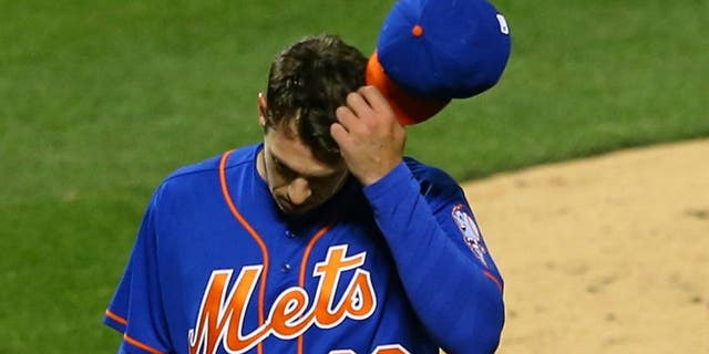 NEW YORK, NEW YORK - APRIL 11: Steven Matz #32 of the New York Mets walks off the mound after giving up 7-runs in the second inning against the Miami Marlins at Citi Field on April 11, 2016 in the Flushing neighborhood of the Queens borough of New York City.