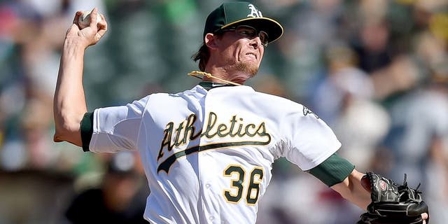 OAKLAND, CA - APRIL 12: Tyler Clippard #36 of the Oakland Athletics pitches against the Seattle Mariners in the top of the tenth inning at O.co Coliseum on April 12, 2015 in Oakland, California. (Photo by Thearon W. Henderson/Getty Images)