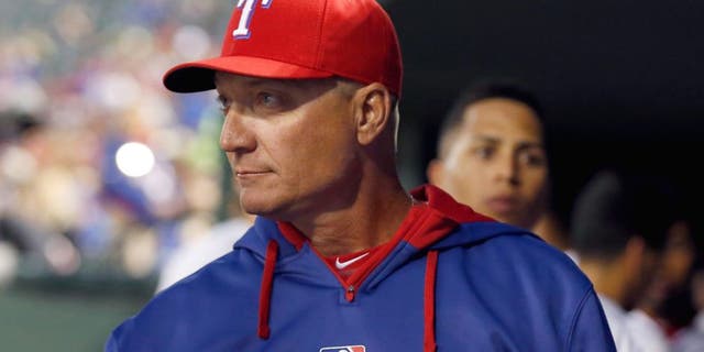 Apr 13, 2015; Arlington, TX, USA; Texas Rangers manager Jeff Banister in the dugout during the game against the Los Angeles Angels at Globe Life Park in Arlington. Mandatory Credit: Matthew Emmons-USA TODAY Sports