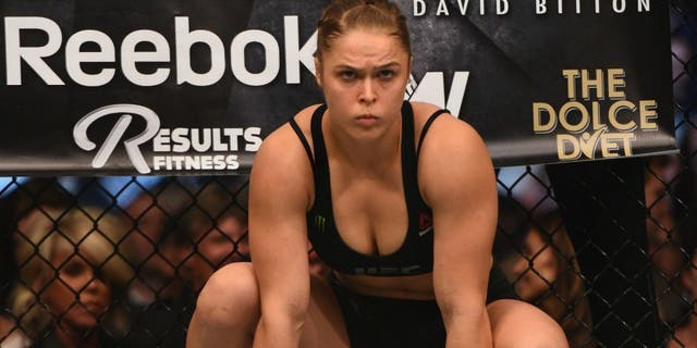 > in their UFC women's bantamweight championship bout during the UFC 184 event at Staples Center on February 28, 2015 in Los Angeles, California.