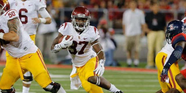 Oct. 11, 2014: Southern California running back Javorius Allen (37) runs for a firstdown against Arizona during the second half of an NCAA college football game.
