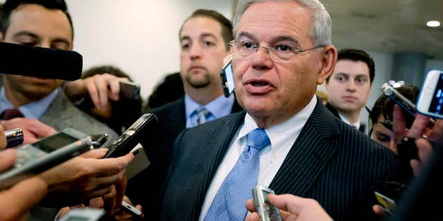 April 14, 2015: In this file photo, Sen. Robert Menendez, D-N.J. speaks with members of the media on Capitol Hill in Washington.