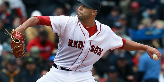 BOSTON - APRIL 11: Red Sox starting pitcher David Price fires a pitch. The Boston Red Sox hosted the Baltimore Orioles at Fenway Park for their home opener of the 2016 Major League Baseball season. (Photo by Jim Davis/The Boston Globe via Getty Images)
