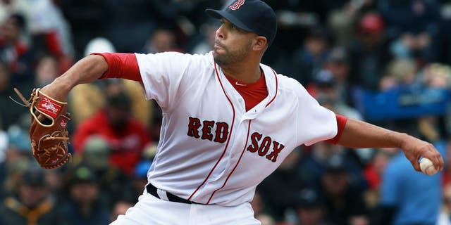 BOSTON - APRIL 11: Red Sox starting pitcher David Price fires a pitch. The Boston Red Sox hosted the Baltimore Orioles at Fenway Park for their home opener of the 2016 Major League Baseball season. (Photo by Jim Davis/The Boston Globe via Getty Images)