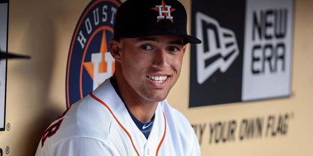 Apr 16, 2014; Houston, TX, USA; Houston Astros right fielder George Springer (4) sits in the dugout before a game against the Kansas City Royals at Minute Maid Park. Mandatory Credit: Troy Taormina-USA TODAY Sports
