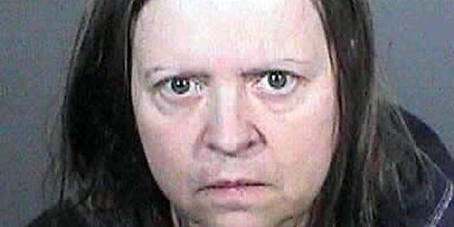 This undated law enforcement booking photo from the Los Angeles County Sheriff's Office shows Cathryn Parker.