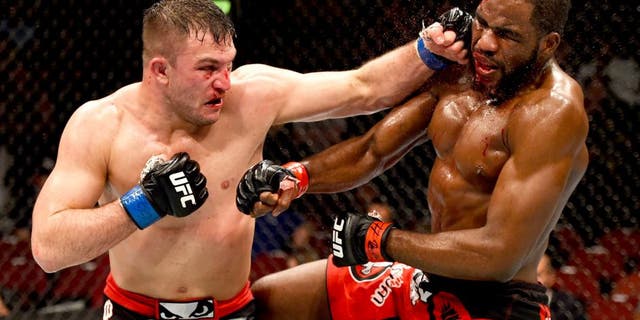 NEWARK, NJ - APRIL 18: Gian Villante punches Corey Anderson in their light heavyweight bout during the UFC Fight Night event at Prudential Center on April 18, 2015 in Newark, New Jersey. (Photo by Josh Hedges/Zuffa LLC/Zuffa LLC via Getty Images)