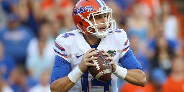Apr 8, 2016; Gainesville, FL, USA; Florida Gators quarterback Luke Del Rio (14) looks to pass in the first quarter of the Orange and Blue at Ben Hill Griffin Stadium. Mandatory Credit: Logan Bowles-USA TODAY Sports