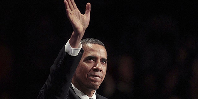 April 20: President Obama waves as he in introduced at the Nob Hill Masonic Center in San Francisco.