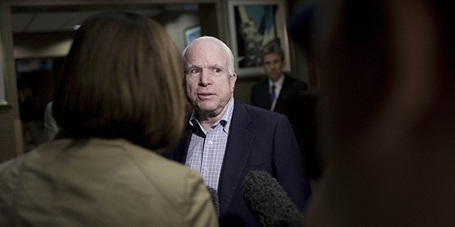 April 22: Sen. John McCain talks with journalists at the Tebisty Hotel in Benghazi, Libya.