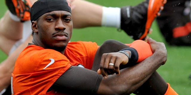 BEREA, OH - APRIL 21, 2016: Quarterback Robert Griffin III #10 of the Cleveland Browns stretches during a voluntary mini camp on April 21, 2016 at the Cleveland Browns training facility in Berea, Ohio. (Photo by Nick Cammett/Diamond Images/Getty Images)